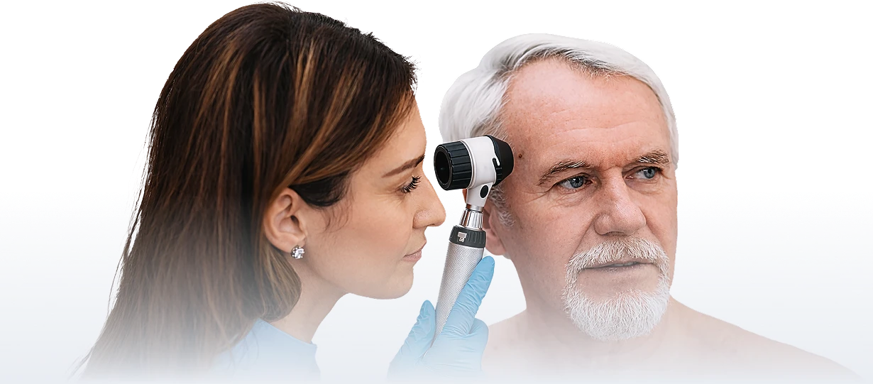 Medical professional examining patient at Just Skin Treatment Clinic